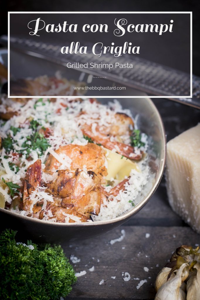 Delicious pasta with smoked garlic and grilled shrimps. Italian food at it's best! Pure food on the grill!